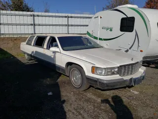 1995 Cadillac Fleetwood z VIN 1G6DW52P2SR700272, wystawiony jako Copart lot #77906824 z przebiegiem Nie podano mil oraz Szkody całkowita. Historia ofert i sprzedaży dostępna na DreamBid. Obrazek 4.