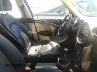 2012 MINI Countryman with VIN WMWZB3C53CWM29495, listed as a IAAI auction lot 42196053 with 77,741 mi miles and . Bid and sale history available at DreamBid. Image 5.