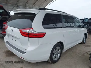 2016 Toyota Sienna LE AAS with VIN 5TDKK3DC3GS706606, listed as a IAAI auction lot 41640543 with 201,316 mi miles. Bid and sale history available at carsss.com. Image 4.