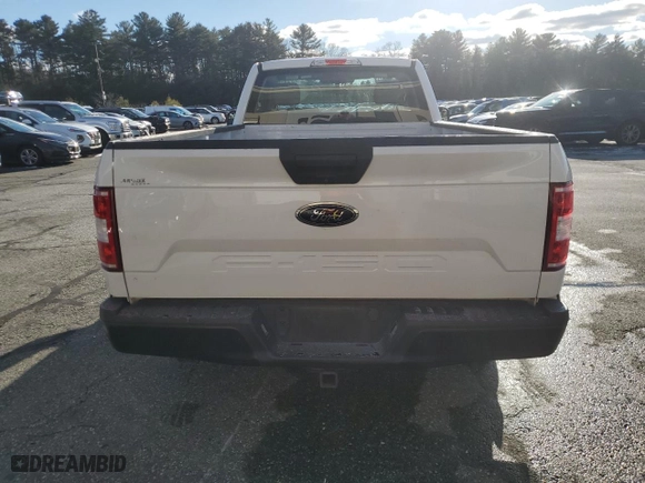 2019 Ford F-150 XL with VIN 1FTMF1CB1KKE30310, listed as a Copart auction lot 83669334 with 32,120 mi miles and Salvage Title. Bid and sale history available at carsss.com. Image 6.