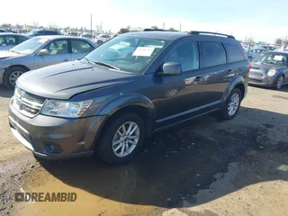 2015 Dodge Journey SXT with VIN 3C4PDCBG9FT696593, listed as a IAAI auction lot 41600713 with 139,763 mi miles. Bid and sale history available at carsss.com. Image 2.