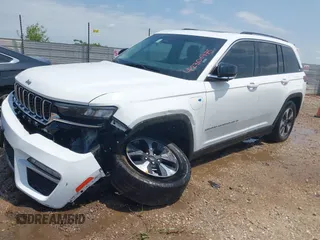 2023 Jeep Grand Cherokee with VIN 1C4RJYB63PC649000, listed as a IAAI auction lot 42306975 with 29,948 mi miles and . Bid and sale history available at DreamBid. Image 2.