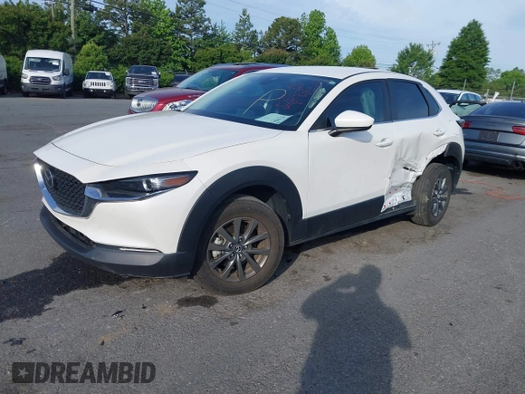 2023 Mazda CX-30 S with VIN 3MVDMBAM8PM545288, listed as a IAAI auction lot 42198433 with 19,609 mi miles and . Bid and sale history available at DreamBid. Image 2.