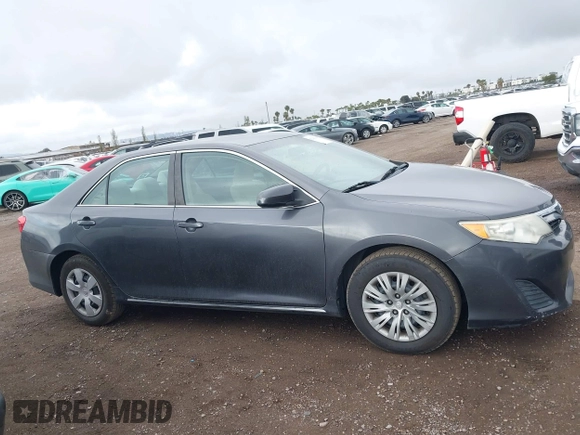 2014 Toyota Camry L with VIN 4T1BF1FK5EU403313, listed as a IAAI auction lot 42141338 with 185,925 mi miles and . Bid and sale history available at DreamBid. Image 13.
