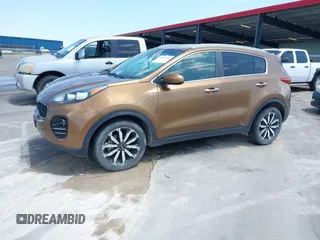 2017 Kia Sportage EX with VIN KNDPNCAC8H7264788, listed as a IAAI auction lot 42513924 with 166,239 mi miles and . Bid and sale history available at DreamBid. Image 2.