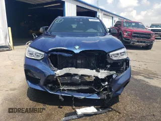 2020 BMW X4 M Competition z VIN 5YMUJ0C08L9C42121, wystawiony jako Copart lot #52499963 z przebiegiem 20 984 mil mil oraz . Historia ofert i sprzedaży dostępna na DreamBid. Obrazek 5.