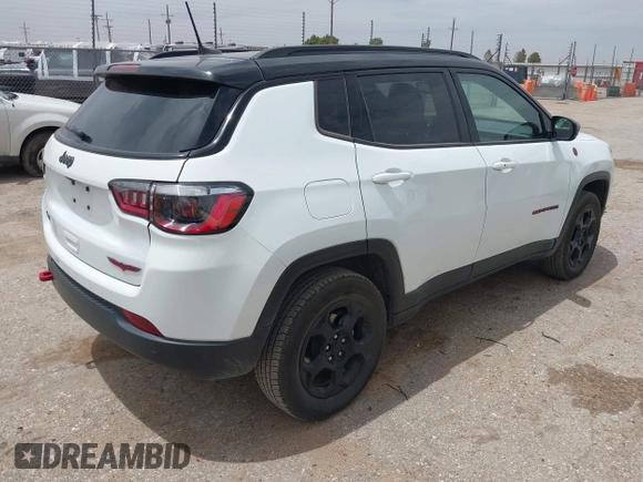 2023 Jeep Compass Trailhawk with VIN 3C4NJDDN3PT544408, listed as a IAAI auction lot 42253800 with 53,105 mi miles and . Bid and sale history available at DreamBid. Image 4.