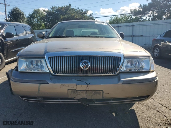 2003 Mercury Grand Marquis GS Convenience with VIN 2MEFM74WX3X707679, listed as a Copart auction lot 73963754 with 75,143 mi miles and Salvage Title. Bid and sale history available at carsss.com. Image 5.