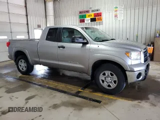 2010 Toyota Tundra с VIN 5TFUM5F11AX006417, выставлен на аукционе Copart как лот 55897725 с пробегом 203 892 миль миль и Списание • Salvage title. История ставок и продаж доступна на DreamBid. Изображение 4.