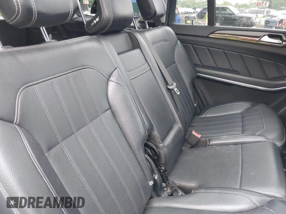 2014 Mercedes-Benz GL 450 with VIN 4JGDF7CE5EA408944, listed as a IAAI auction lot 42397384 with 182,106 mi miles and . Bid and sale history available at DreamBid. Image 8.