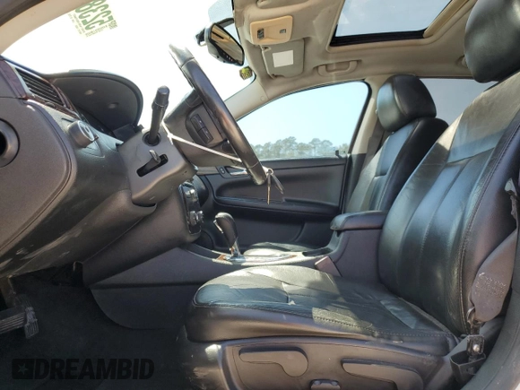 2014 Chevrolet Impala LTZ with VIN 2G1WC5E35E1108183, listed as a Copart auction lot 52382965 with 192,748 mi miles and Salvage Title. Bid and sale history available at DreamBid. Image 7.