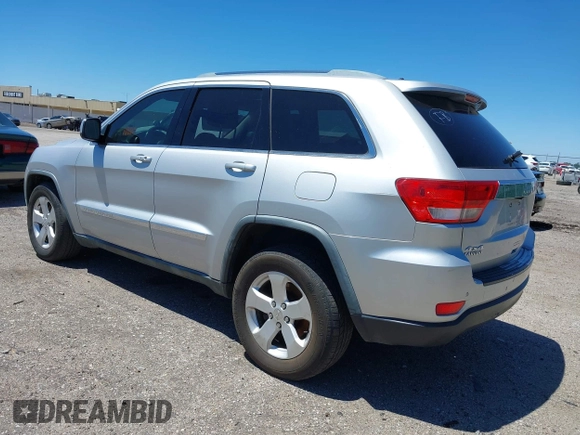 2011 Jeep Grand Cherokee Laredo with VIN 1J4RR4GG2BC737400, listed as a IAAI auction lot 42259167 with 153,211 mi miles and . Bid and sale history available at DreamBid. Image 3.