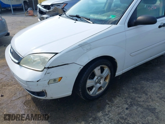 2005 Ford Focus S with VIN 1FAHP34N45W230950, listed as a IAAI auction lot 42467778 with 203,697 mi miles and . Bid and sale history available at DreamBid. Image 6.