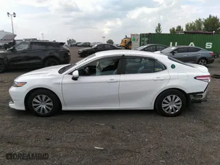 2020 Toyota Camry Hybrid LE with VIN 4T1C31AK2LU518579, listed as a IAAI auction lot 39981154 with 115,005 mi miles. Bid and sale history available at carsss.com. Image 15.