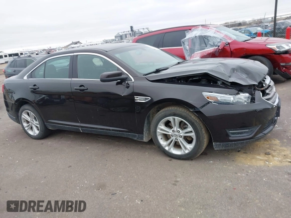 2014 Ford Taurus SEL z VIN 1FAHP2E85EG121636, wystawiony jako IAAI lot #41036886 z przebiegiem 117 460 mil mil oraz . Historia ofert i sprzedaży dostępna na DreamBid. Obrazek 13.