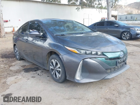 2018 Toyota Prius Plus with VIN JTDKARFPXJ3104302, listed as a IAAI auction lot 42127312 with 87,531 mi miles and . Bid and sale history available at DreamBid. Image 1.