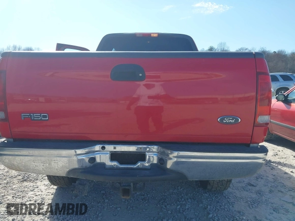 2003 Ford F-150 XL with VIN 1FTRX18W03NA04817, listed as a IAAI auction lot 41599127 with 170,682 mi miles. Bid and sale history available at carsss.com. Image 6.