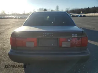 1995 Audi A6 z VIN WAUGA84A2SN055887, wystawiony jako Copart lot #85212394 z przebiegiem 254 307 mil mil oraz Tytuł czysty. Historia ofert i sprzedaży dostępna na DreamBid. Obrazek 6.