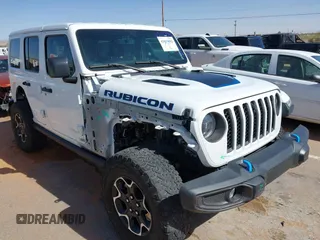 2023 Jeep Wrangler Rubicon with VIN 1C4JJXR63PW580370, listed as a IAAI auction lot 42017282 with 31,823 mi miles and . Bid and sale history available at DreamBid. Image 1.