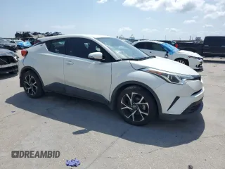 2018 Toyota C-HR XLE with VIN NMTKHMBX2JR045151, listed as a Copart auction lot 54699505 with 122,431 mi miles and Salvage Title. Bid and sale history available at carsss.com. Image 4.