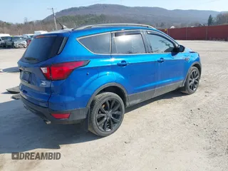 2019 Ford Escape SE with VIN 1FMCU9GD7KUB44070, listed as a IAAI auction lot 41801706 with 77,612 mi miles. Bid and sale history available at carsss.com. Image 4.