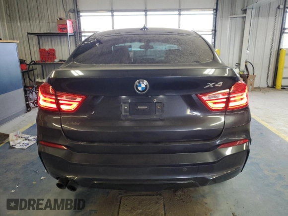 2015 BMW X4 xDrive35i with VIN 5UXXW5C51F0E88340, listed as a Copart auction lot 41765245 with 140,510 mi miles and Clean title. Bid and sale history available at DreamBid. Image 6.