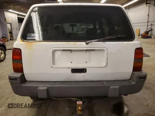 1993 Jeep Grand Cherokee Laredo with VIN 1J4GZ58SXPC554642, listed as a Copart auction lot 83268254 with 266,063 mi miles and Salvage Title. Bid and sale history available at carsss.com. Image 6.