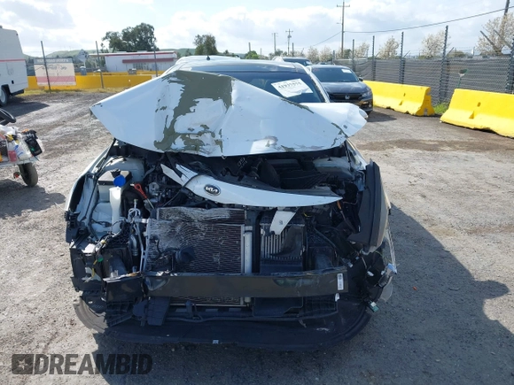 2016 Kia Optima SX Turbo with VIN 5XXGW4L25GG016639, listed as a IAAI auction lot 41937575 with 81,336 mi miles and . Bid and sale history available at carsss.com. Image 13.