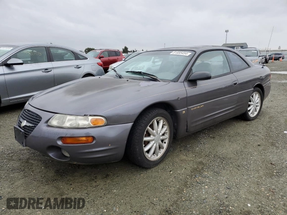 1997 Chrysler Sebring LXi z VIN 4C3AU52N2VE183090, wystawiony jako Copart lot #81855454 z przebiegiem 157 590 mil mil oraz Szkoda całkowita • Salvage title. Historia ofert i sprzedaży dostępna na DreamBid. Obrazek 1.