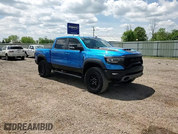 2022 Ram 1500 TRX with VIN 1C6SRFU93NN229879, listed as a Copart auction lot 58710335 with 8,047 mi miles and Salvage title. Bid and sale history available at DreamBid. Image 14.