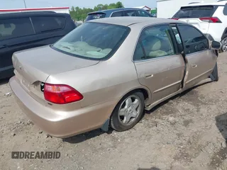 2000 Honda Accord EX with VIN 1HGCG1651YA025062, listed as a IAAI auction lot 42123069 with 221,614 mi miles and . Bid and sale history available at DreamBid. Image 4.