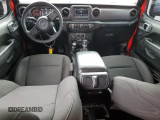 2023 Jeep Wrangler Sport with VIN 1C4HJXDG5PW527992, listed as a Copart auction lot 73312234 with 32,686 mi miles and Salvage Title. Bid and sale history available at DreamBid. Image 8.