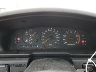 1990 Nissan Maxima z VIN JN1HJ01P8LT402950, wystawiony jako Copart lot #82714734 z przebiegiem 60 727 mil mil oraz Tytuł czysty. Historia ofert i sprzedaży dostępna na DreamBid. Obrazek 9.