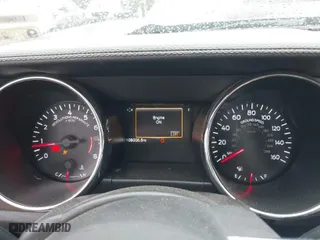 2016 Ford Mustang EcoBoost with VIN 1FA6P8TH2G5206705, listed as a IAAI auction lot 41683550 with 108,006 mi miles. Bid and sale history available at carsss.com. Image 7.