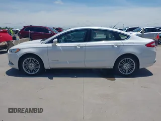 2014 Ford Fusion SE Hybrid with VIN 3FA6P0LUXER233658, listed as a IAAI auction lot 42311588 with 106,282 mi miles and . Bid and sale history available at DreamBid. Image 14.