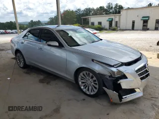 2014 Cadillac CTS Performance RWD with VIN 1G6AS5SX5E0140562, listed as a Copart auction lot 64336615 with 86,564 mi miles and Salvage title. Bid and sale history available at DreamBid. Image 4.
