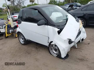 2009 Smart fortwo Pure with VIN WMEEJ31X39K314325, listed as a IAAI auction lot 41607981 with 59,684 mi miles. Bid and sale history available at carsss.com. Image 1.