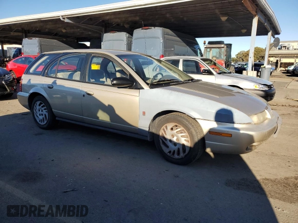 1999 Saturn SW z VIN 1G8ZK8271XZ368987, wystawiony jako Copart lot #82610964 z przebiegiem 222 100 mil mil oraz Czysty tytuł • Clean title. Historia ofert i sprzedaży dostępna na DreamBid. Obrazek 4.