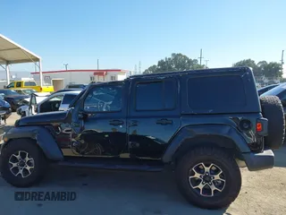 2023 Jeep Wrangler Willys with VIN 1C4HJXDN0PW597768, listed as a IAAI auction lot 41645815 with 23,717 mi miles and . Bid and sale history available at DreamBid. Image 15.
