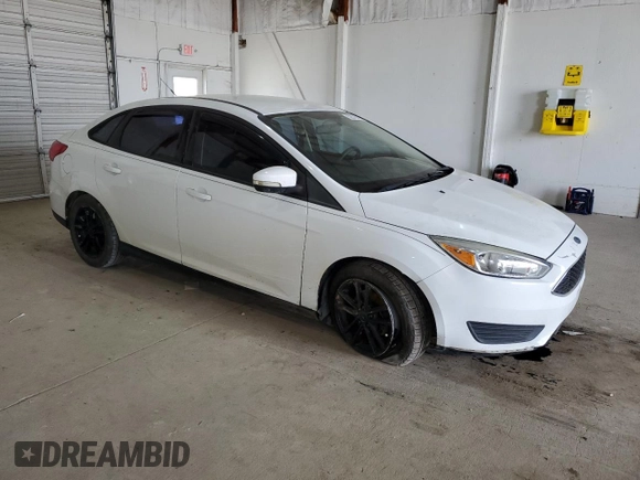 2016 Ford Focus SE z VIN 1FADP3F26GL404670, wystawiony jako Copart lot #52876095 z przebiegiem 80 425 mil mil oraz Szkoda całkowita • Salvage title. Historia ofert i sprzedaży dostępna na DreamBid. Obrazek 4.