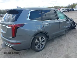 2020 Cadillac XT6 FWD Premium Luxury z VIN 1GYKPCRS9LZ129763, wystawiony jako IAAI lot #42052532 z przebiegiem 57 670 mil mil oraz . Historia ofert i sprzedaży dostępna na DreamBid. Obrazek 4.
