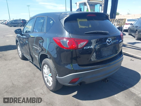 2013 Mazda CX-5 Touring with VIN JM3KE2CEXD0153589, listed as a IAAI auction lot 41855356 with 86,030 mi miles and . Bid and sale history available at DreamBid. Image 3.