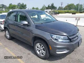 2013 Volkswagen Tiguan SE z VIN WVGAV7AX3DW020767, wystawiony jako IAAI lot #42433752 z przebiegiem 107 913 mil mil oraz . Historia ofert i sprzedaży dostępna na DreamBid. Obrazek 1.