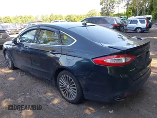 2013 Ford Fusion Titanium with VIN 3FA6P0K91DR115901, listed as a IAAI auction lot 42779096 with 191,451 mi miles and . Bid and sale history available at DreamBid. Image 3.
