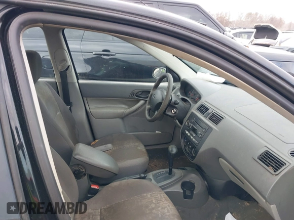 2005 Ford Focus S with VIN 1FAFP34N75W304479, listed as a IAAI auction lot 41117405 with 234,312 mi miles. Bid and sale history available at carsss.com. Image 5.