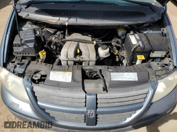 2007 Dodge Caravan SE z VIN 1D4GP25B57B116909, wystawiony jako Copart lot #54077655 z przebiegiem 41 605 mil mil oraz Czysty tytuł • Clean title. Historia ofert i sprzedaży dostępna na DreamBid. Obrazek 12.