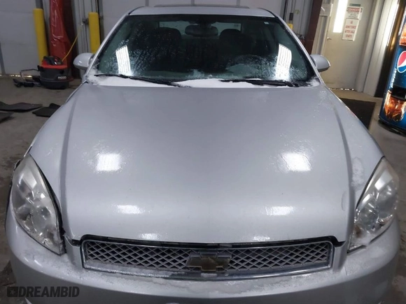 2014 Chevrolet Impala Limited LT with VIN 2G1WB5E37E1122072, listed as a IAAI auction lot 41322111 with NaN miles. Bid and sale history available at carsss.com. Image 12.