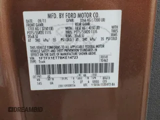 2011 Ford F-150 XL with VIN 1FTFX1ET7BKE14723, listed as a Copart auction lot 50583885 with 118,935 mi miles and Salvage Title. Bid and sale history available at DreamBid. Image 12.