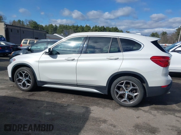 2019 BMW X1 xDrive28i with VIN WBXHT3C56K5L35842, listed as a IAAI auction lot 41981409 with 54,325 mi miles. Bid and sale history available at carsss.com. Image 14.