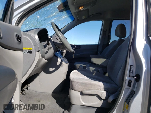 2009 Kia Sedona LX with VIN KNDMB233496304472, listed as a Copart auction lot 47272105 with 184,370 mi miles and Salvage Title. Bid and sale history available at carsss.com. Image 7.
